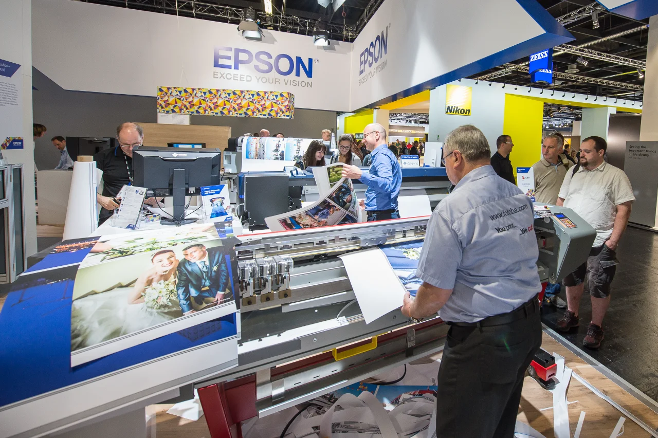 Epson SureColor wide-format printer producing photographic output